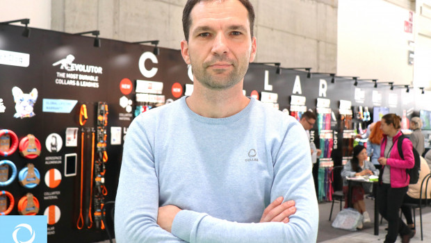 A picture from happier times: company founder Yuriy Sinitsa in front of Collar Company’s stand at Zoomark International in Bologna.
