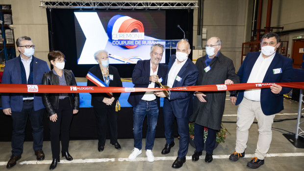 Fressnapf boss Torsten Toeller, centre, marked the opening of the new logistics hub with French colleagues.