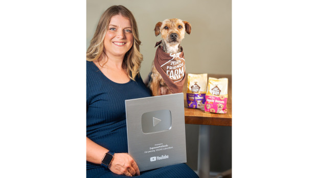 Supreme marketing executive Julie Fowles and fur baby Polly celebrate the award win.