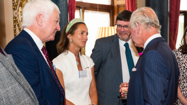 The moment when Carina Evans was welcomed by King Charles at a Buckingham Palace reception.