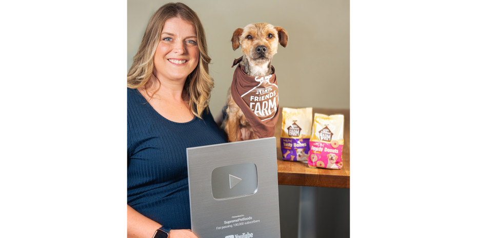Supreme marketing  executive Julie Fowles and fur baby Polly celebrate the award win.